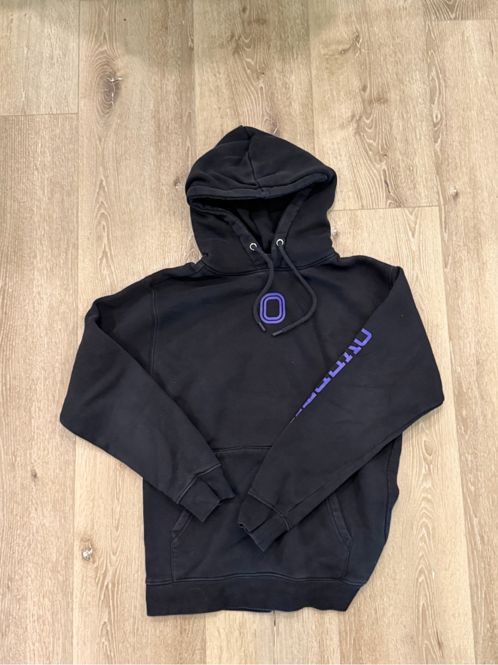 Black Hoodie with Purple 'O' Detail